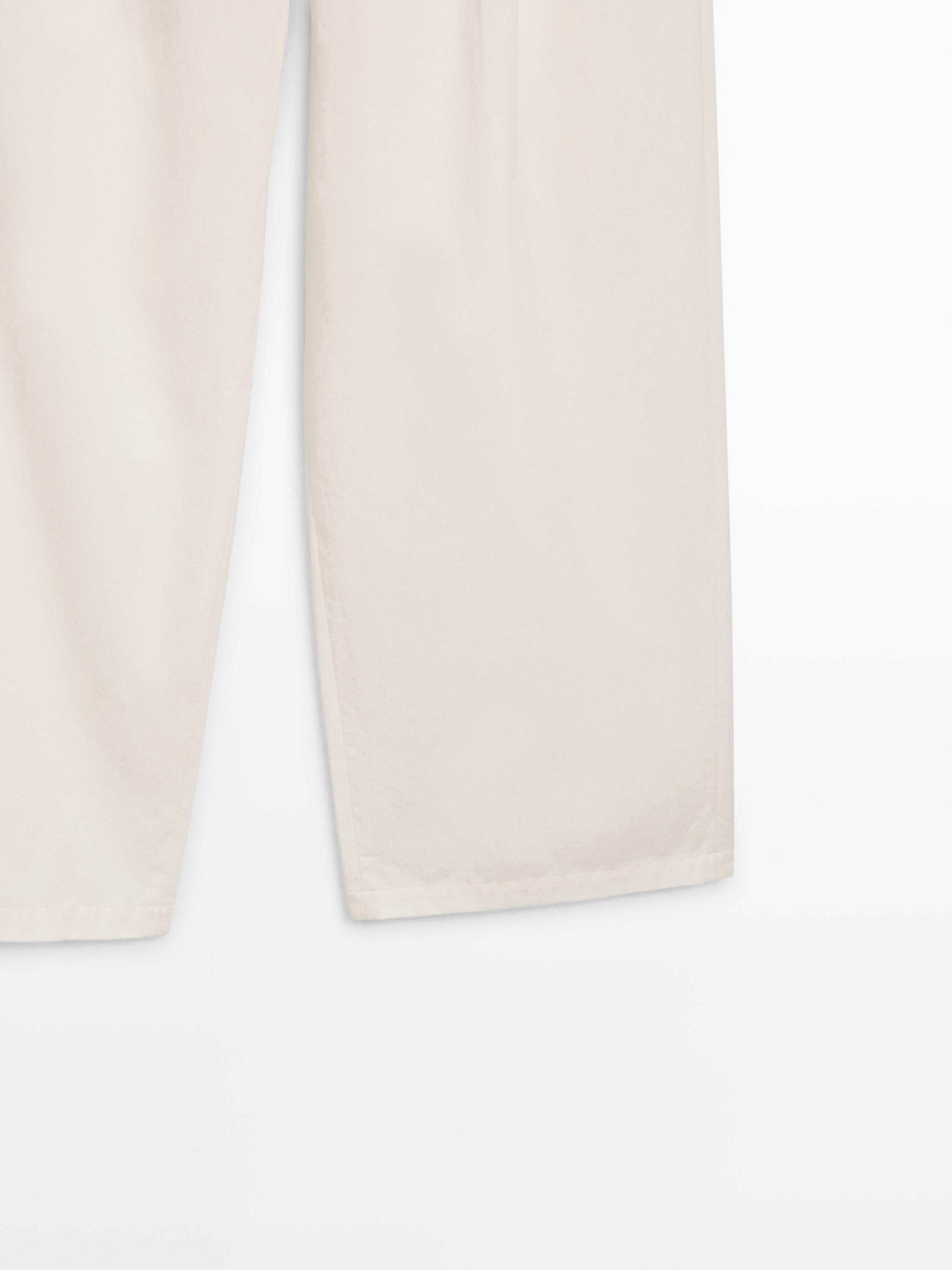Pleated trousers with crossover fastening - STUDIO
